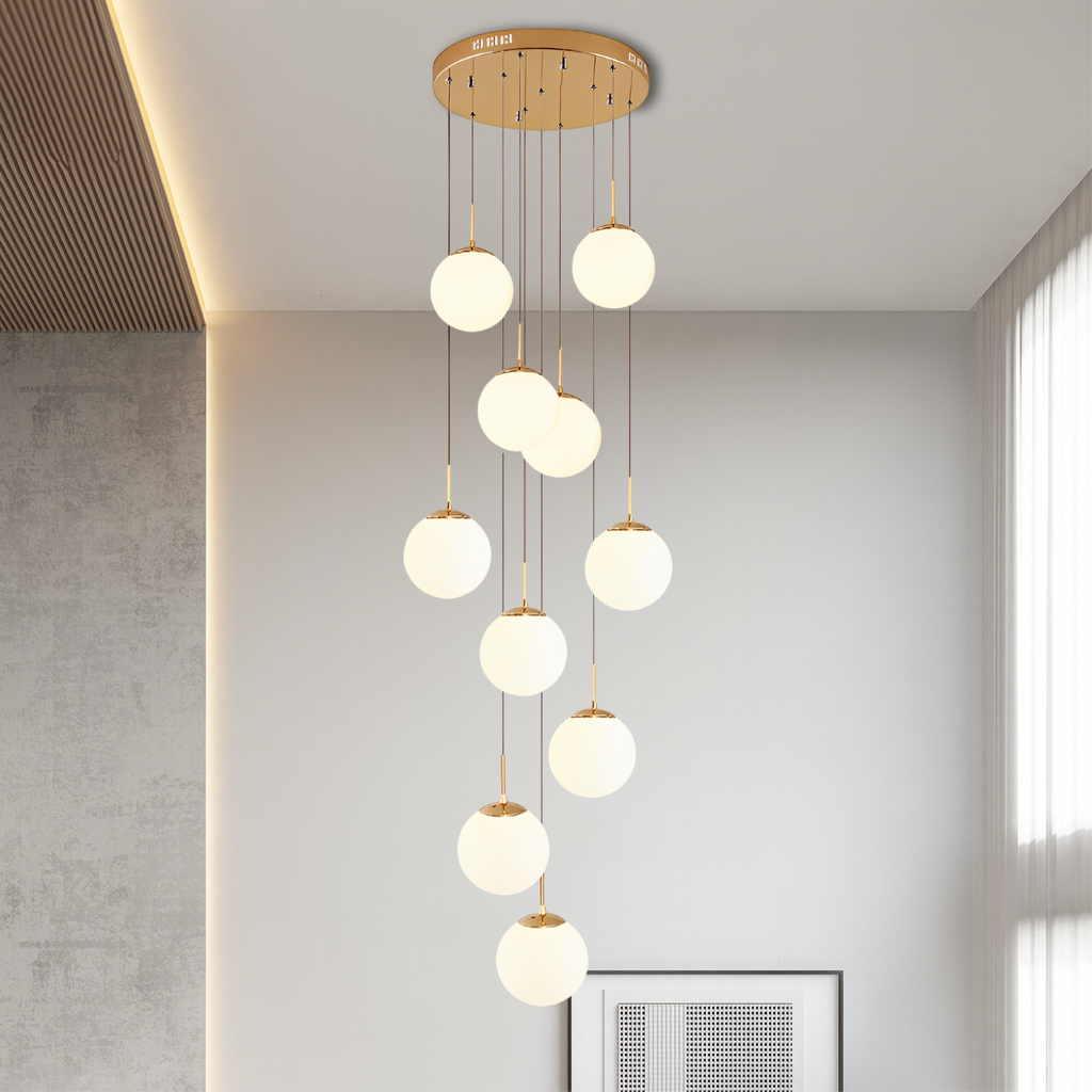 Nexa Chandelier Light | Cascading Glass Spheres with Gold Trim